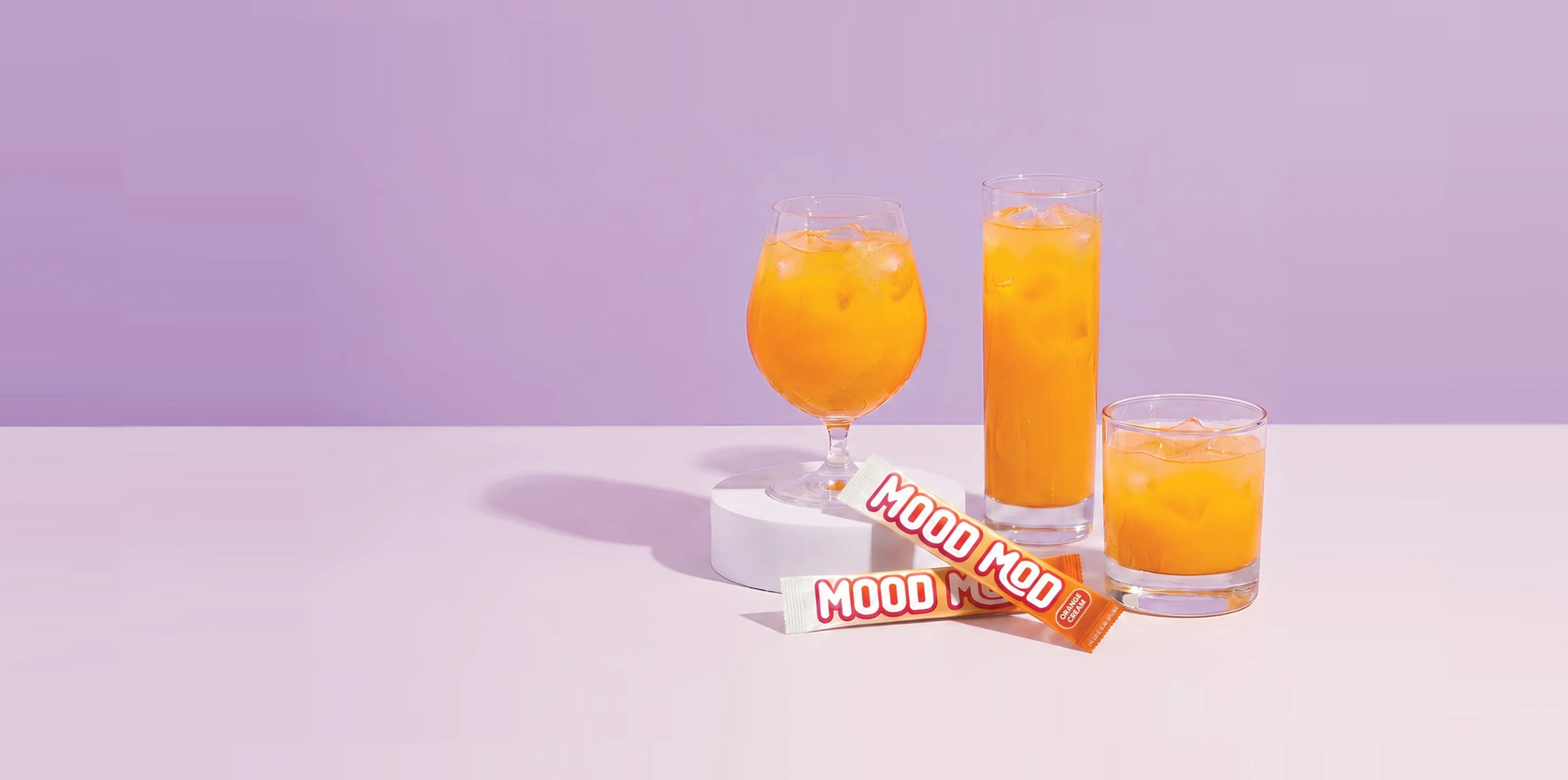 Mood Mod saffron orange cream drink mix, iced drinks and stick packs for calm and natural stress relief.
